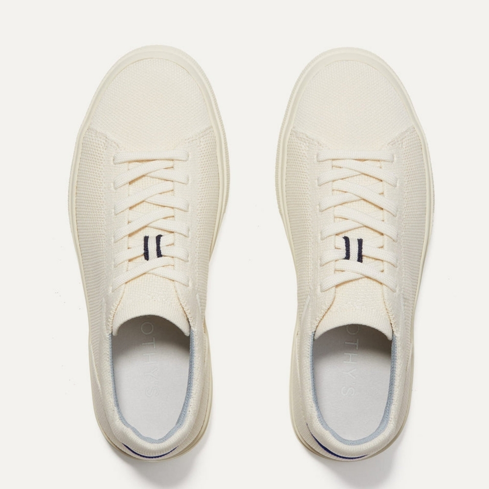 Rothy's Cream Canvas Sneakers with Navy Accent